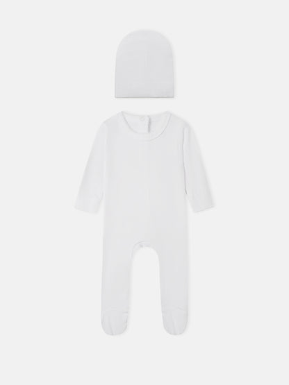 Legacy Stitch White layette set by Adee; 2-piece unisex white ribbed knit hat and footed romper.