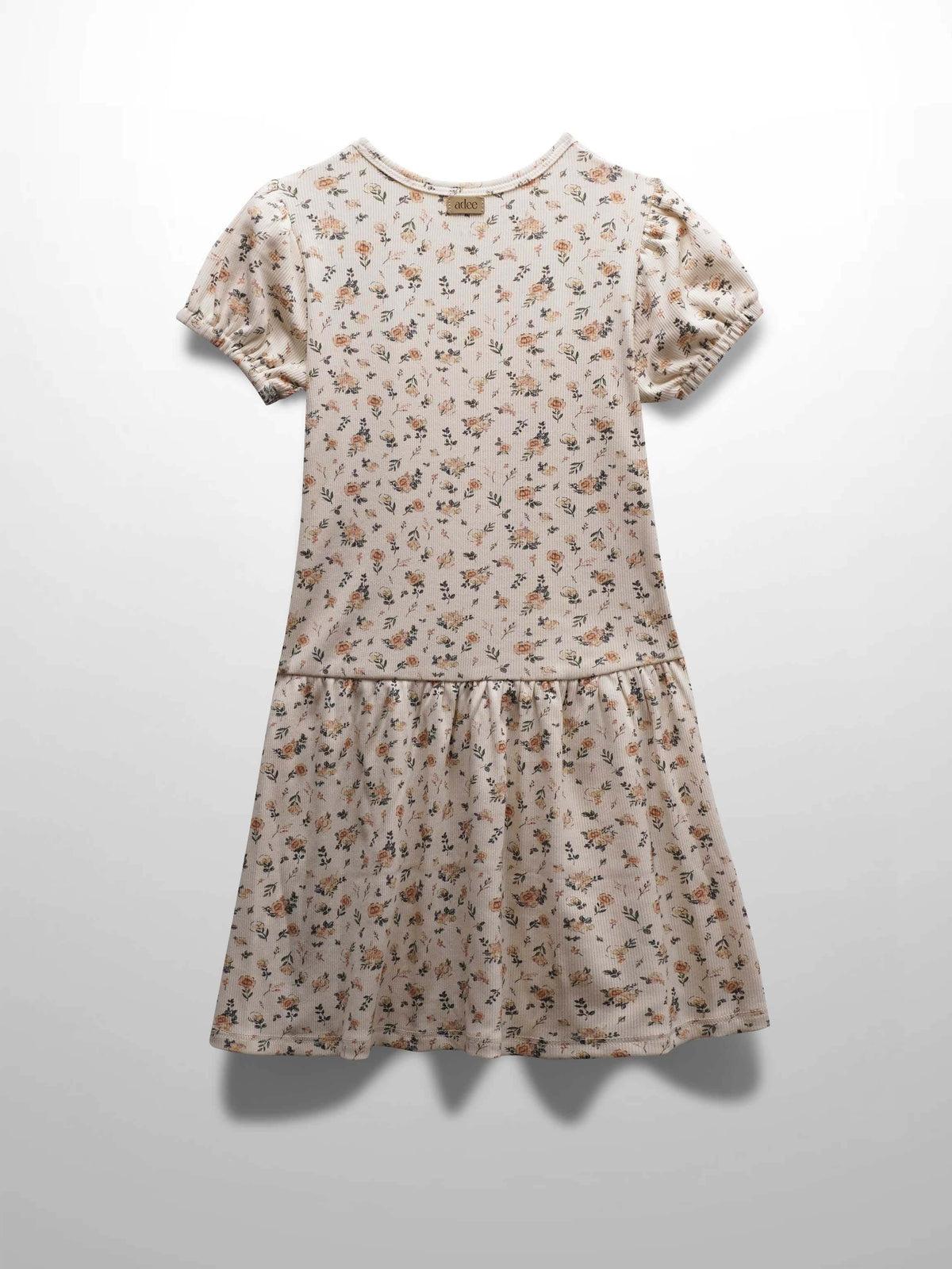Petit floral dress with short bubble sleeves, off-white fabric, hand-painted pink flowers and leaves, flared drop waist