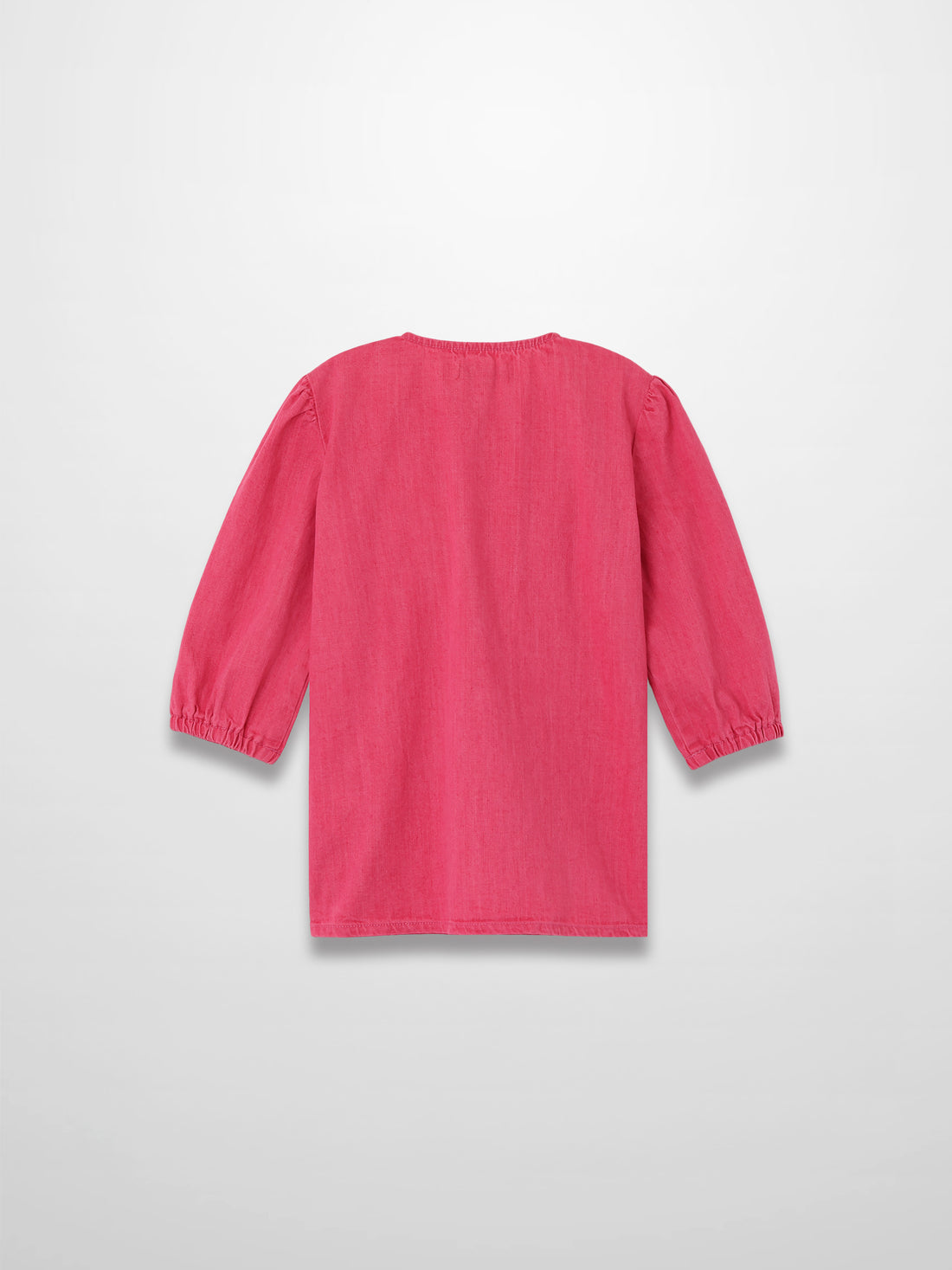 Back view of pink denim 3/4 sleeve Henley top with gathered cuffs.