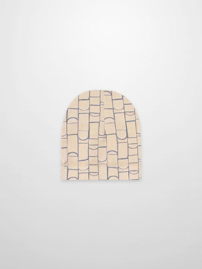 Geometric hat for boys, beige knit with blue geometric shapes