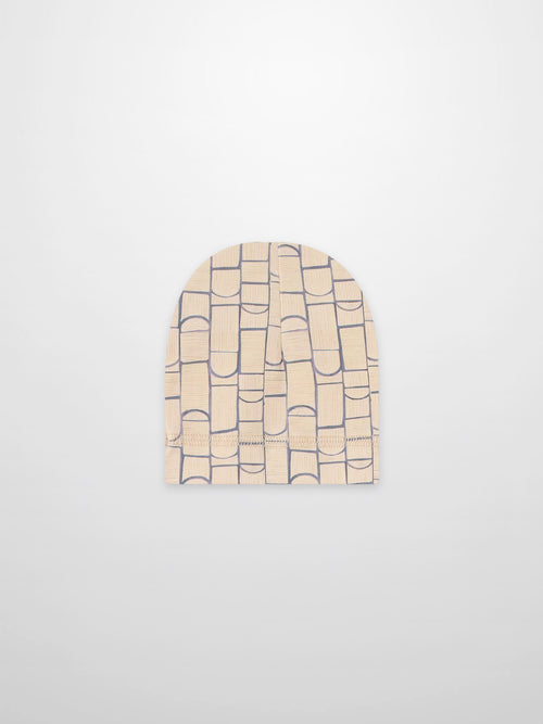 Geometric hat for boys, beige knit with blue geometric shapes