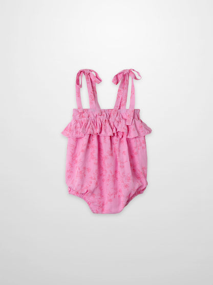 Pink floral girls romper dressy with ruffled top and tied straps