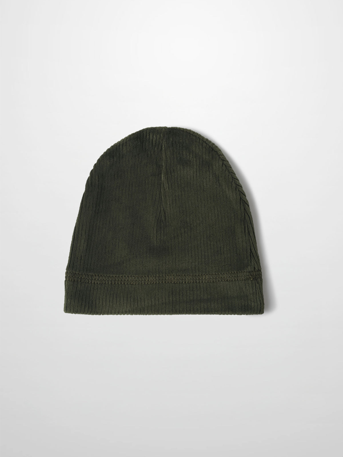 Olive green corduroy baby beanie with ribbed texture and folded cuff.