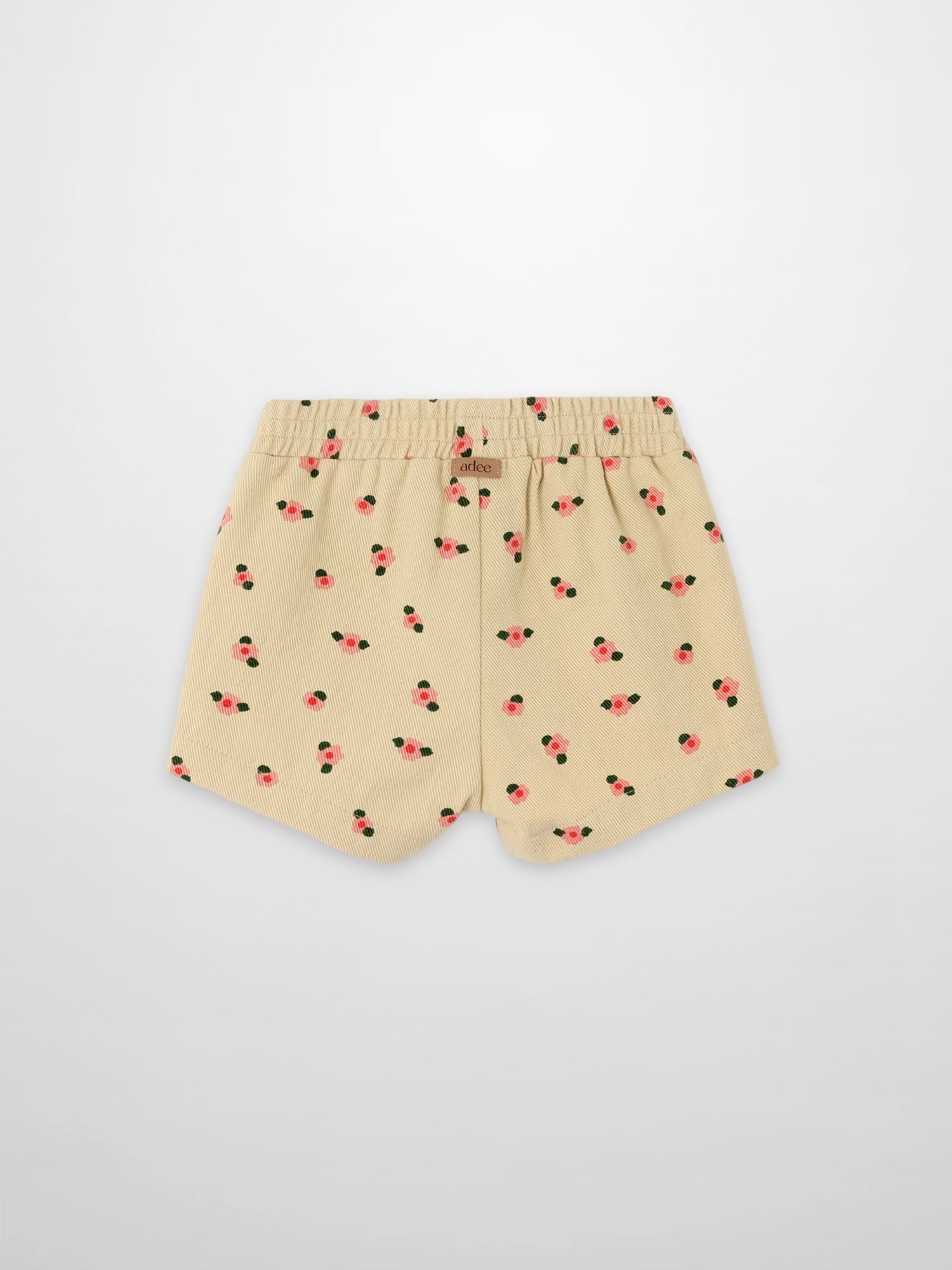 Tan floral shorts for girls by Adee; beige fabric with pink flowers and elastic waistband.