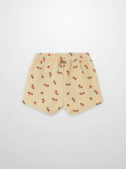 Tan floral shorts for girls by Adee; beige fabric with pink flowers and elastic waistband.
