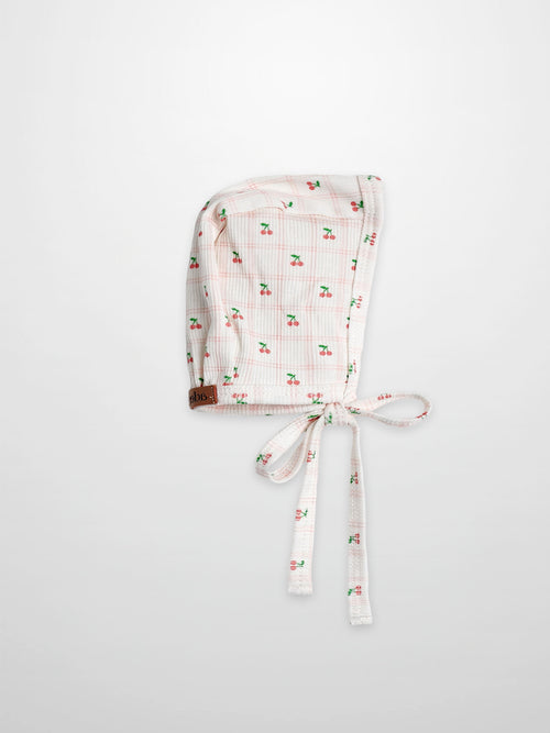 Cherry Window Bonnet for girls, pink thin-ribbed fabric with cherry print and tie closure Adee