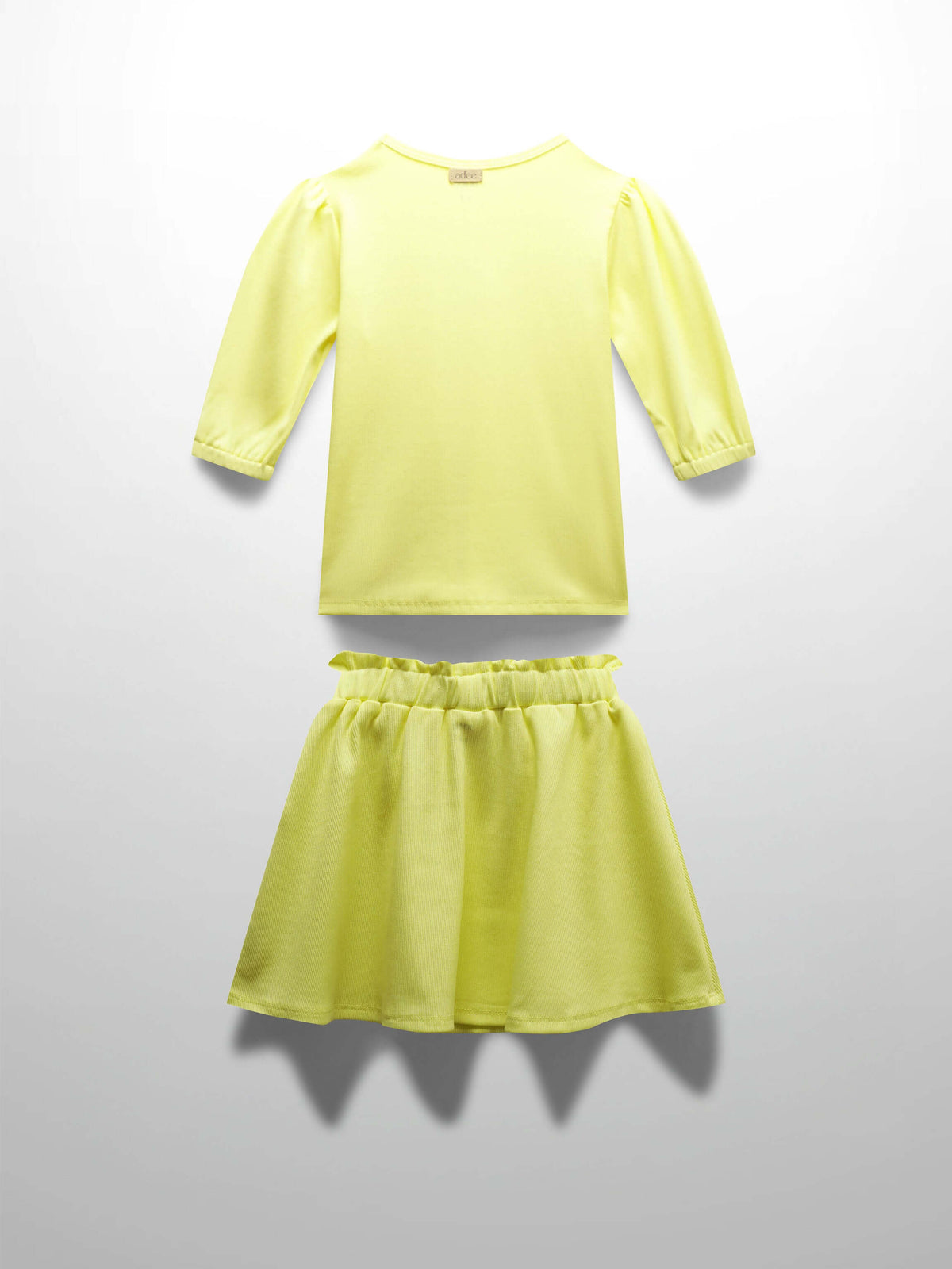 Yellow ribbed skirt and shirt for girls