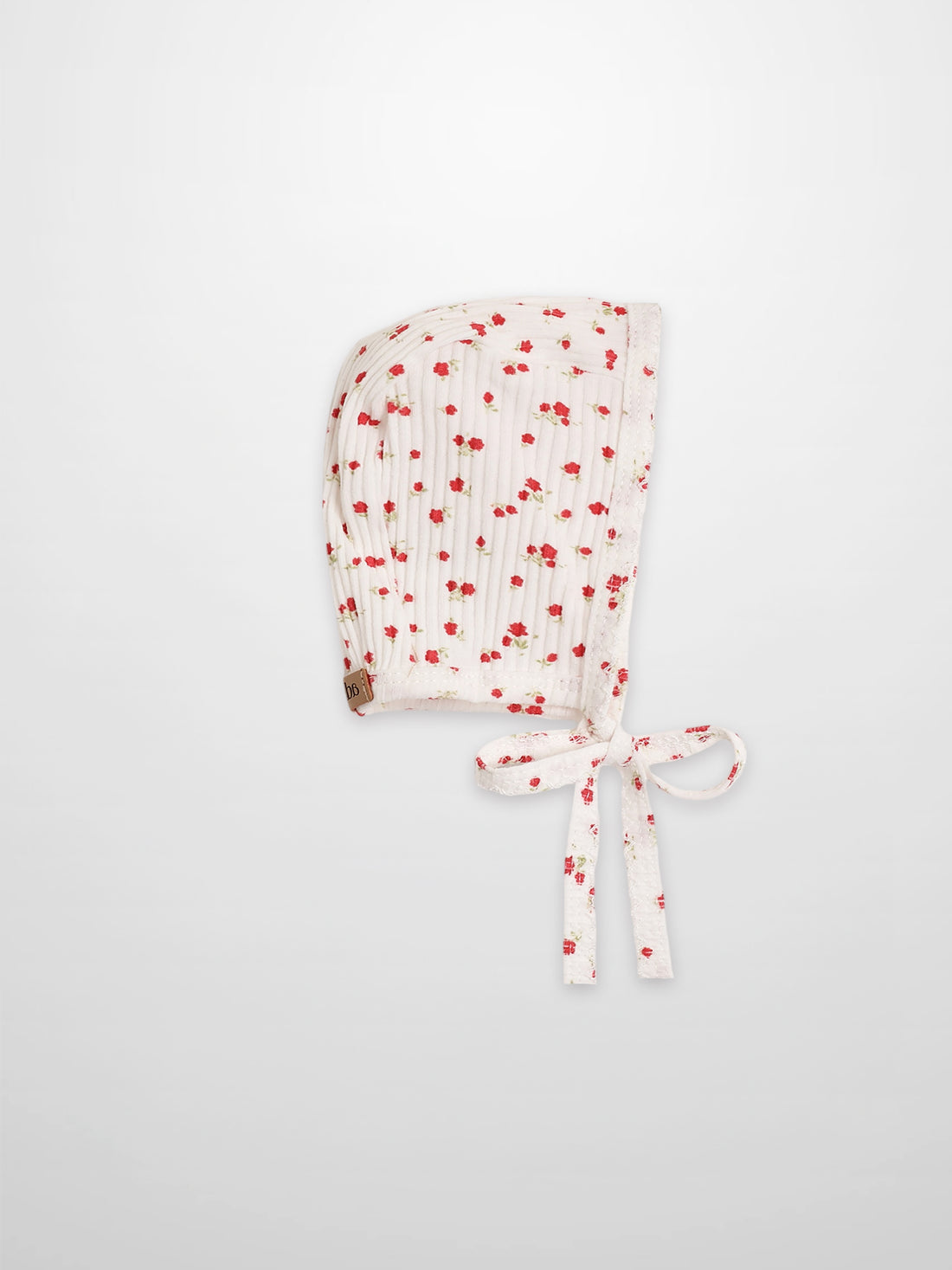 Red Flower Bonnet for girls; white fabric with delicate red floral print and tie straps