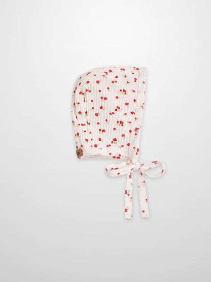 Red Flower Bonnet for girls; white fabric with delicate red floral print and tie straps