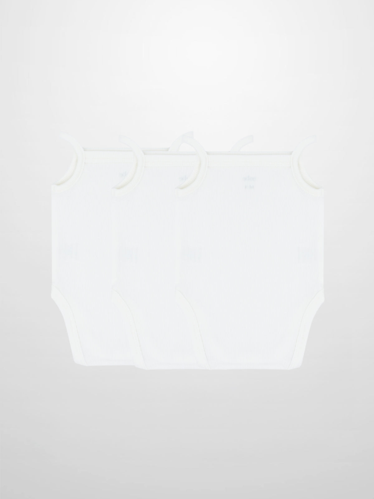 Three white ribbed undershirts with thin straps and a square neck, featuring snap-bottom closures in a 3-pack
