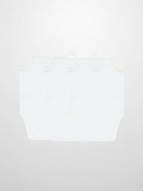 Three white ribbed undershirts with thin straps and a square neck, featuring snap-bottom closures in a 3-pack