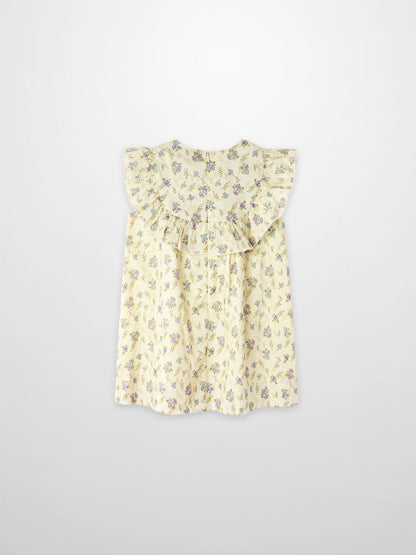 Ivory flower dress for girls, sleeveless with floral print and ruffled bodice.