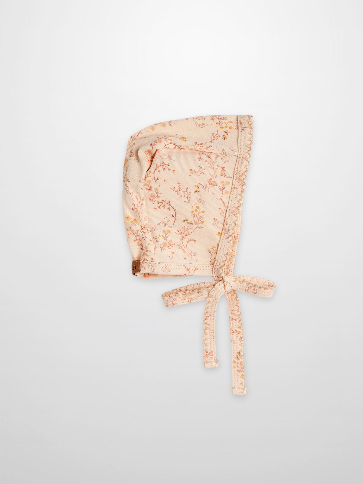 Sweet Meadow Bonnet for girls by Adee in peach floral print with lace trim and ties