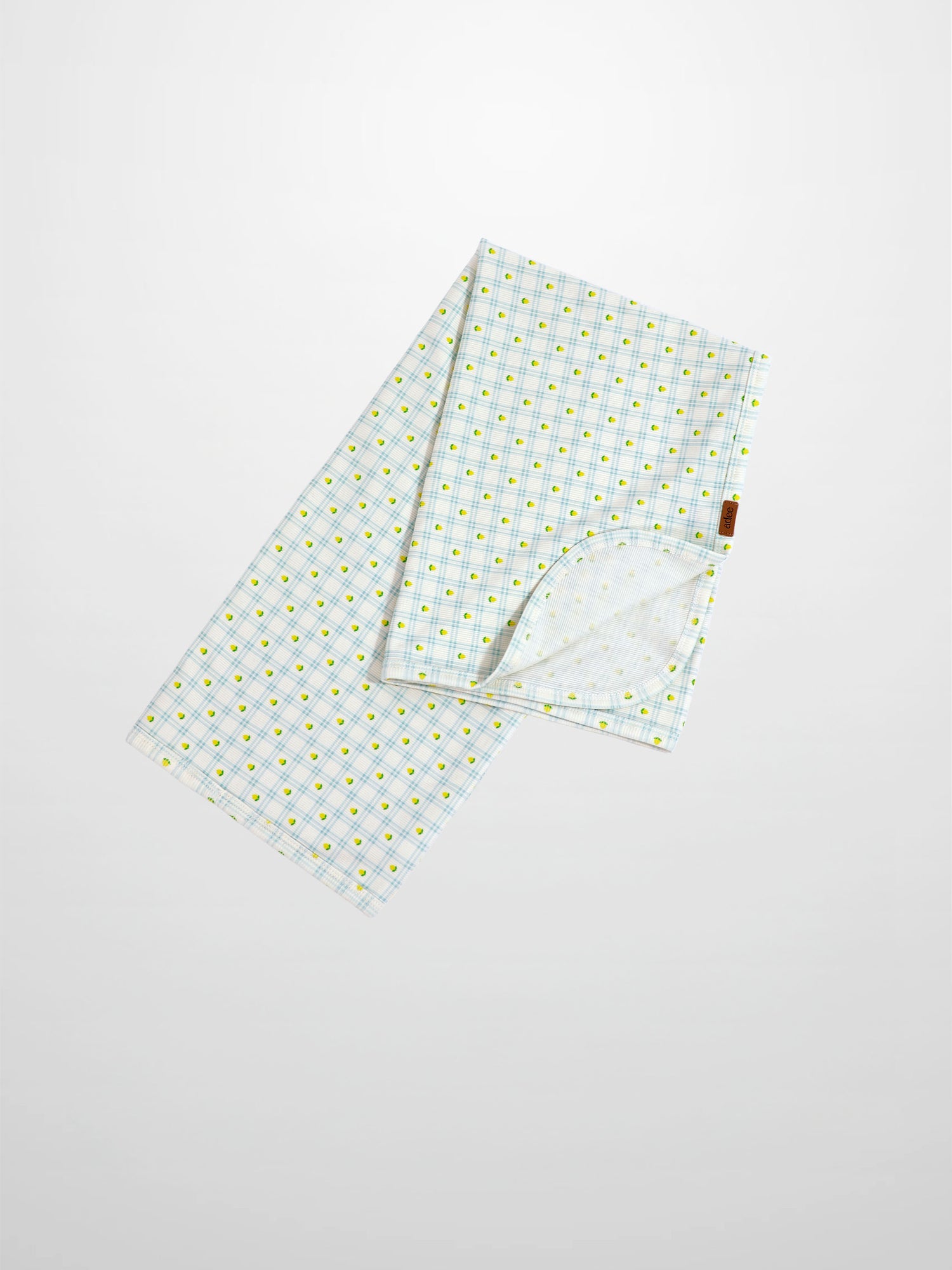 Lemon Window Blanket, Adee boys swaddle blanket in white with light blue grid and yellow lemon motifs