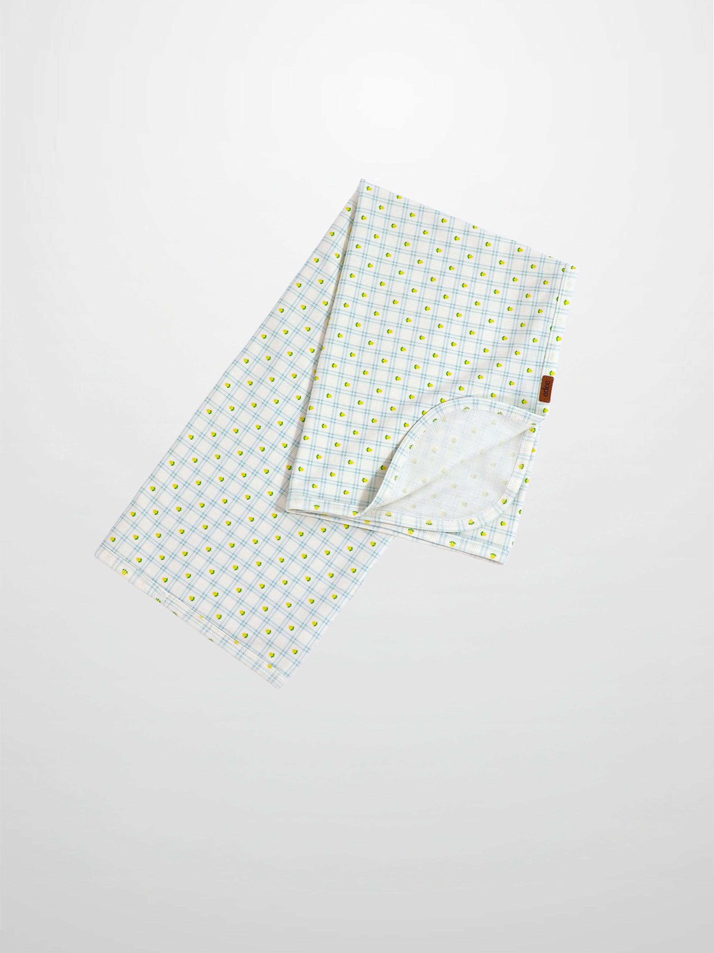 Lemon Window Blanket, Adee boys swaddle blanket in white with light blue grid and yellow lemon motifs