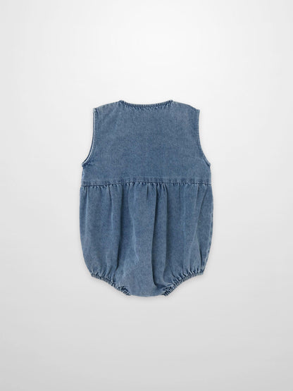 Blue denim romper for boys, sleeveless one-piece with elastic leg openings.