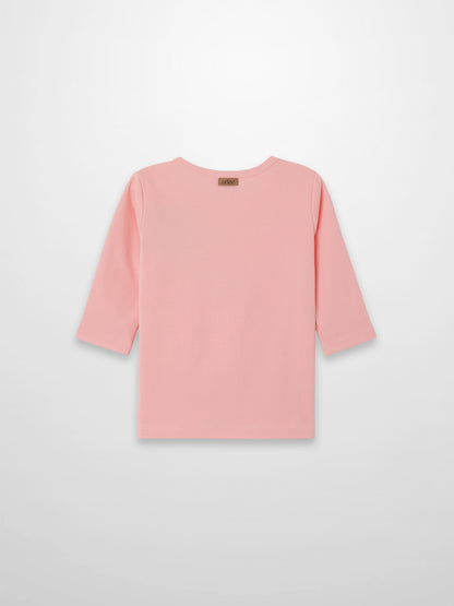 Back view of light pink 3/4 sleeve emblem T-shirt with a small brand tag at the back neckline.