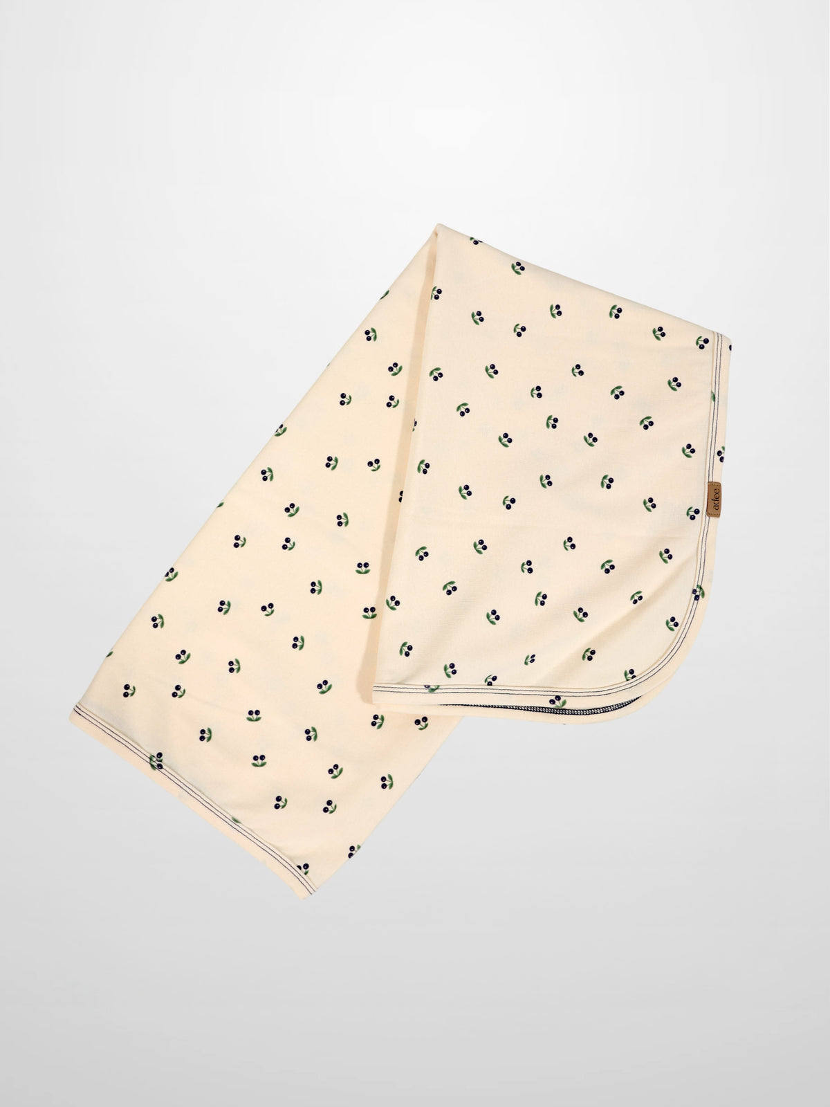 Blue Cherry Blanket swaddle for boys by Adee; cream fabric with scattered blue cherries