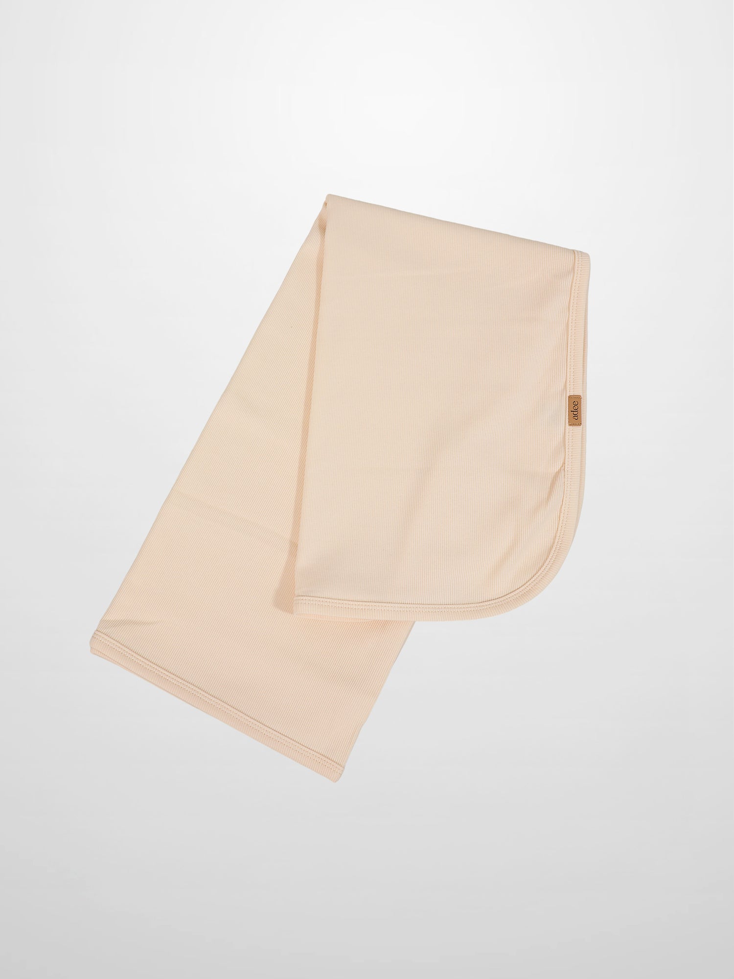 Thin Ribbed Blanket cream by Adee, unisex