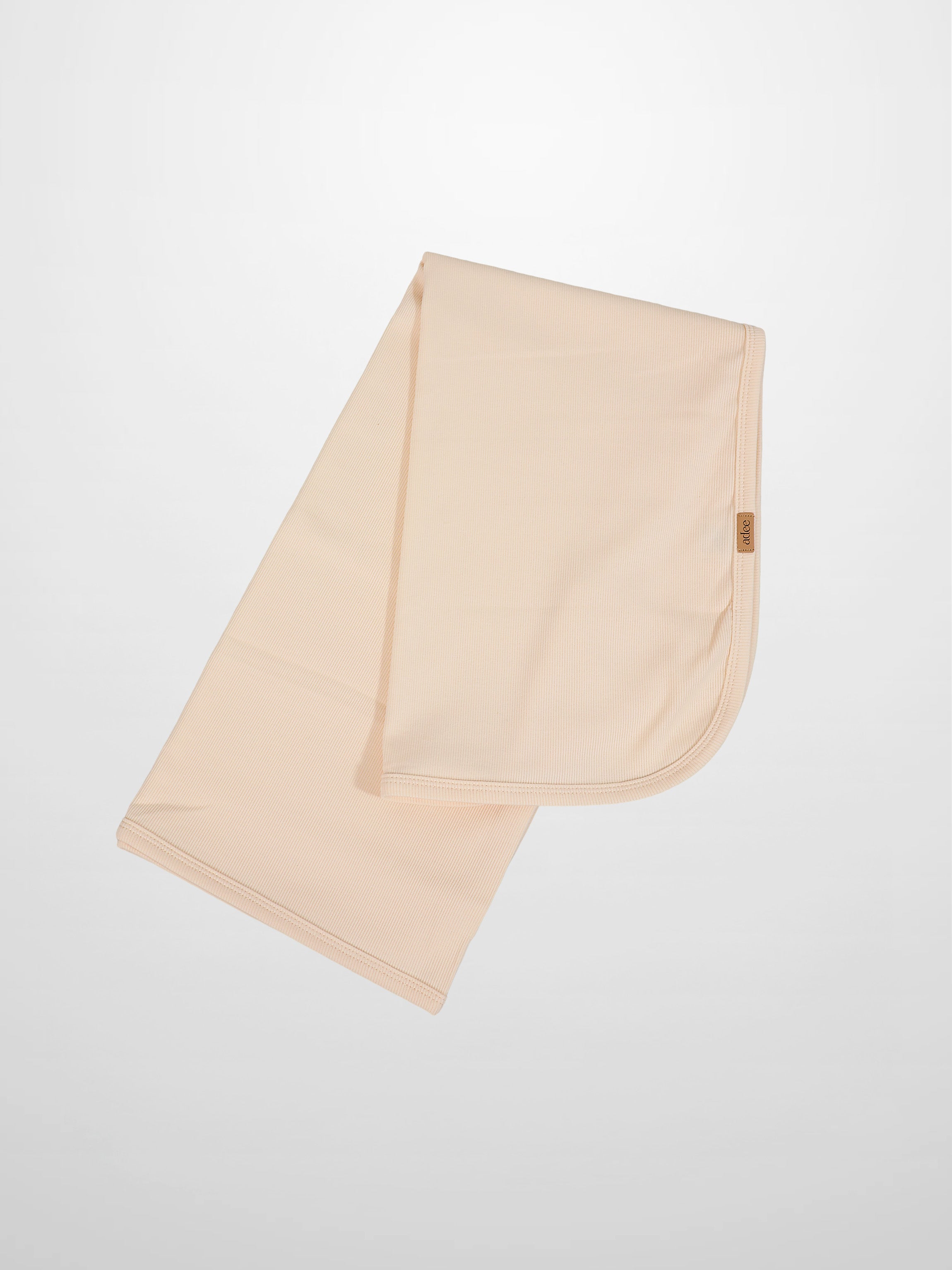 Thin Ribbed Blanket cream by Adee, unisex