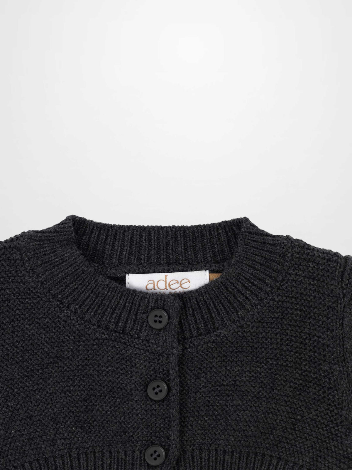 Cropped cardigan in heather grey by Adee; knit fabric with button-front