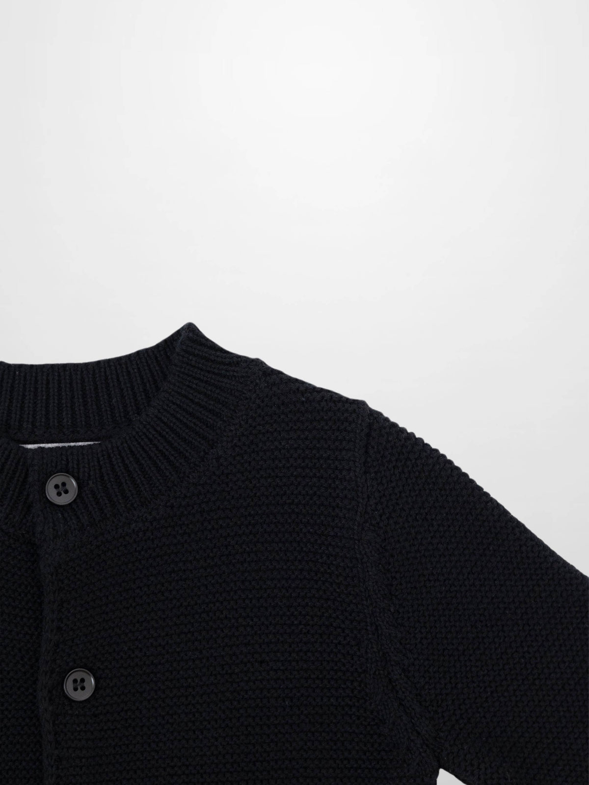 Knit cardigan in black by Adee; unisex dressy top from Apparel &amp; Accessories