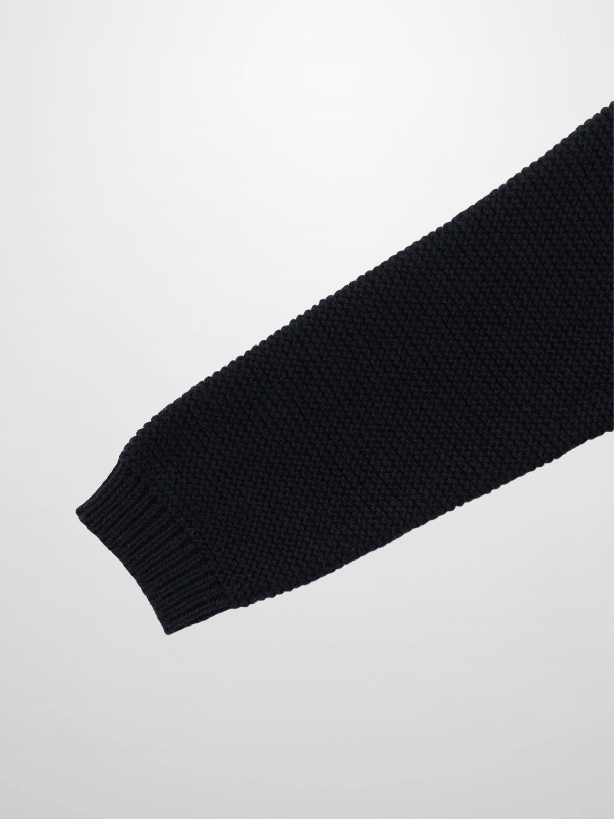 Knit Cardigan sleeve in black; Adee brand, textured knit with ribbed cuff