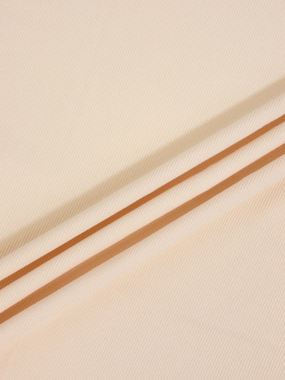 Thin ribbed tan beanie by Adee; unisex apparel accessory