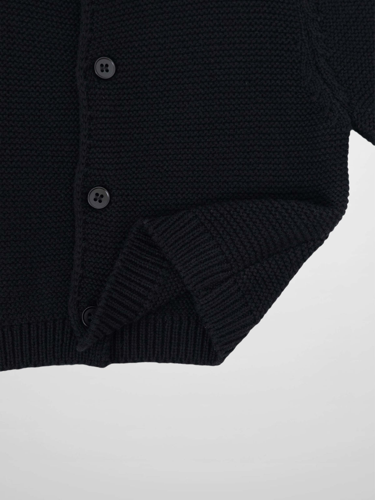 Knit cardigan, black, button-front with ribbed cuffs.