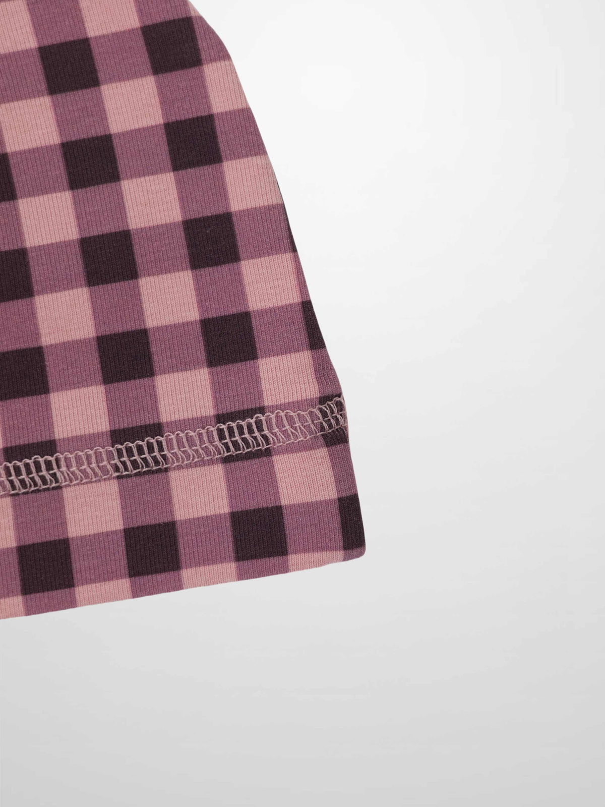 Girls Beanie by Adee in pink and red gingham knit with a check pattern.