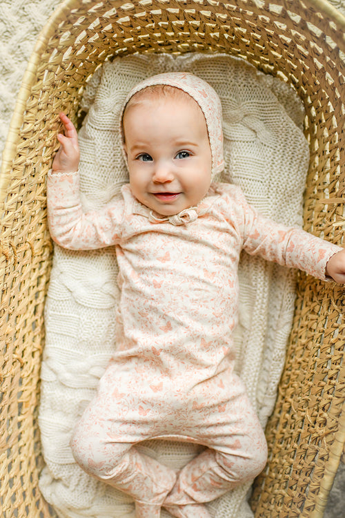cute baby wearing a bonnet hat and jumpsuit Stretchy