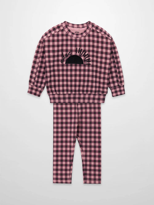 Gingham Pajamas - Burgundy for girls by Adee, pink and burgundy check top with sun graphic and matching pants.