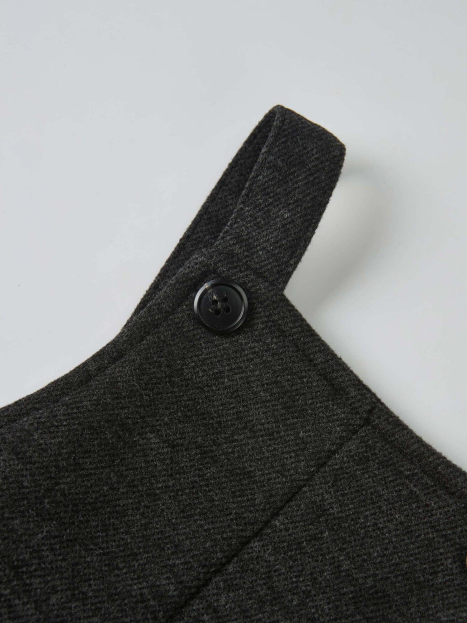 Textured Twill Overalls for boys in grey by Adee; close-up of shoulder strap with button