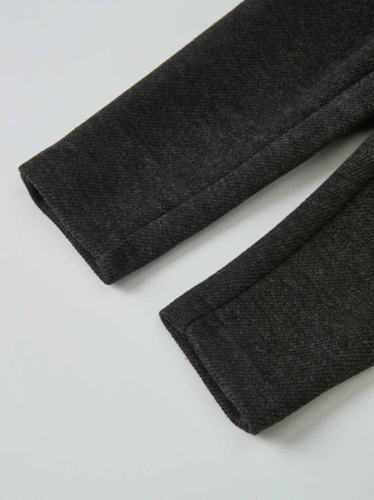 Textured grey twill overalls fabric, boys dressy style, close-up of cuffs