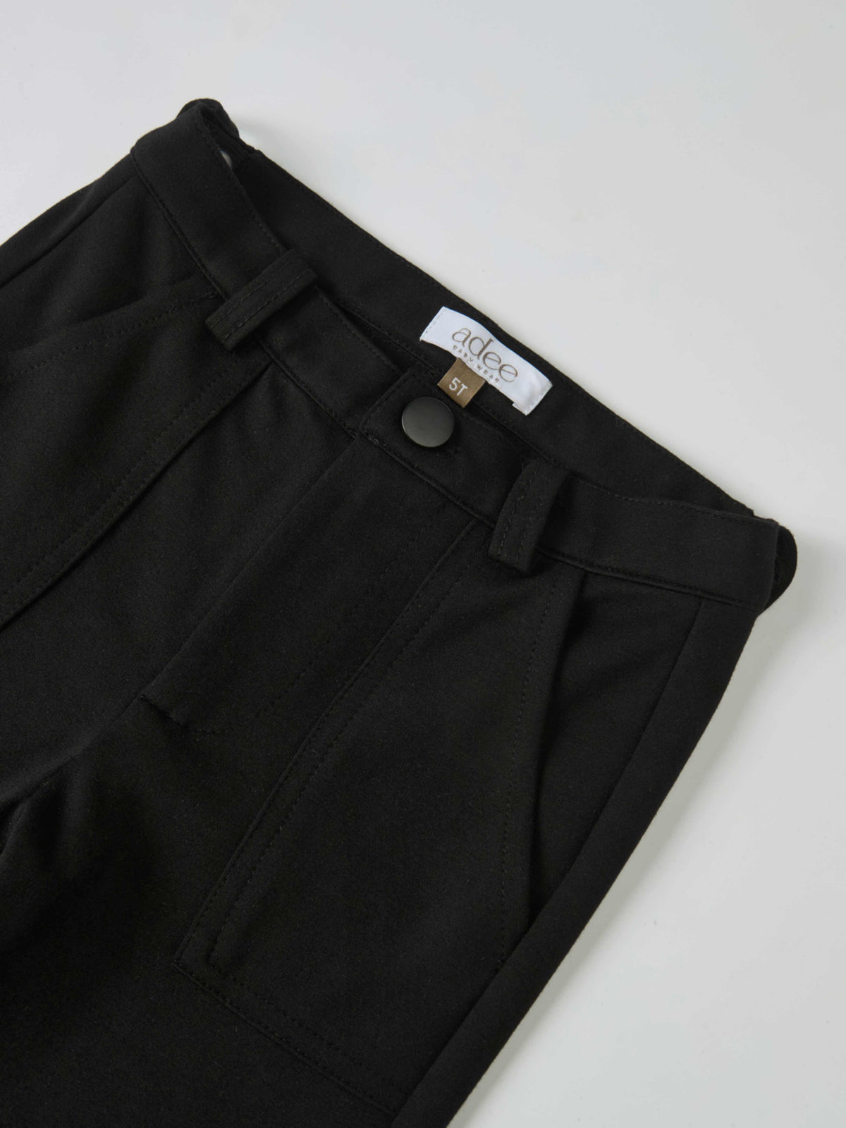 Adee boys dress pants in black with belt loops, front pockets, and a metal button; size 5T.