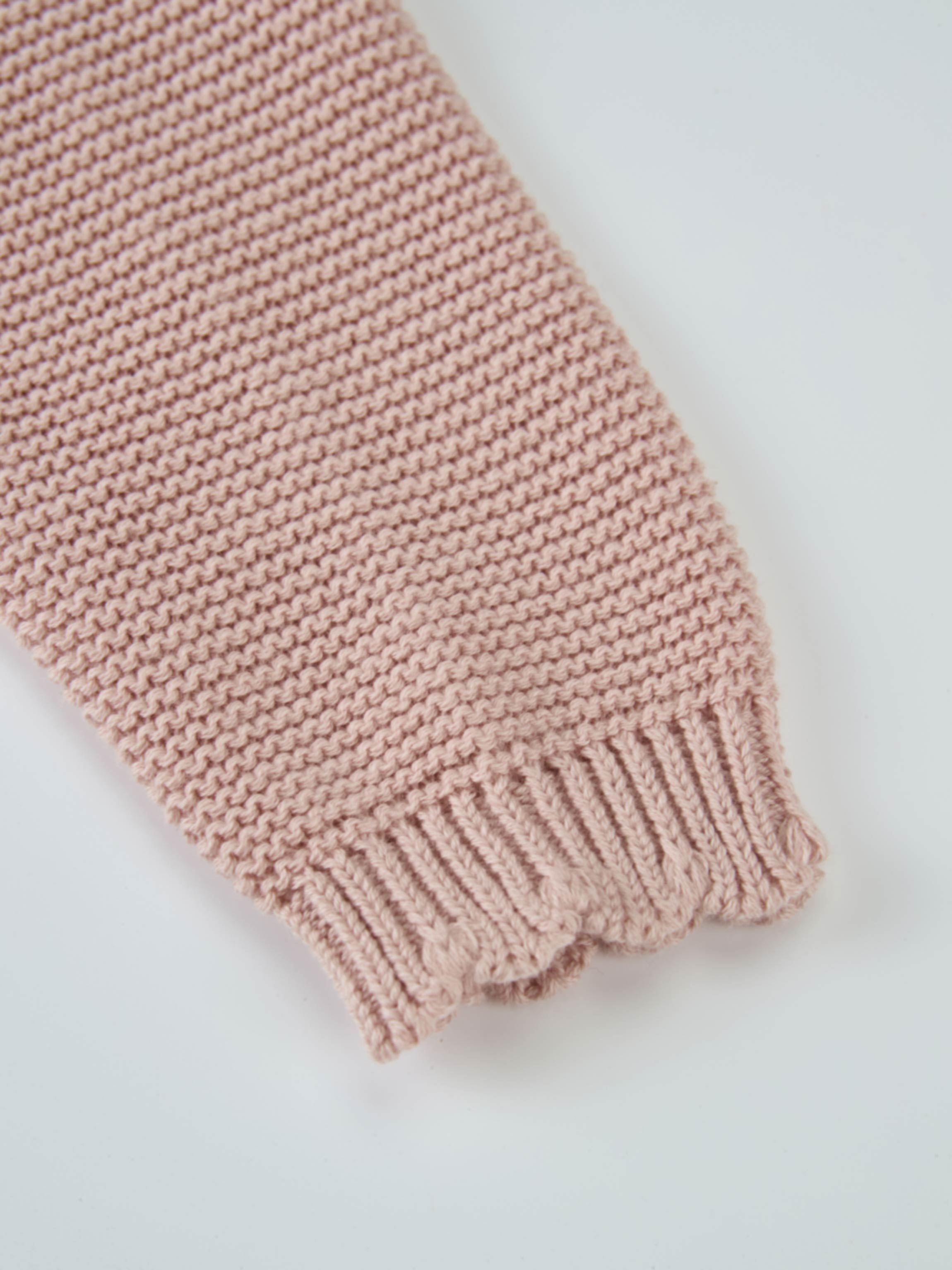 Girls cropped cardigan by Adee in light pink knit with scalloped trim
