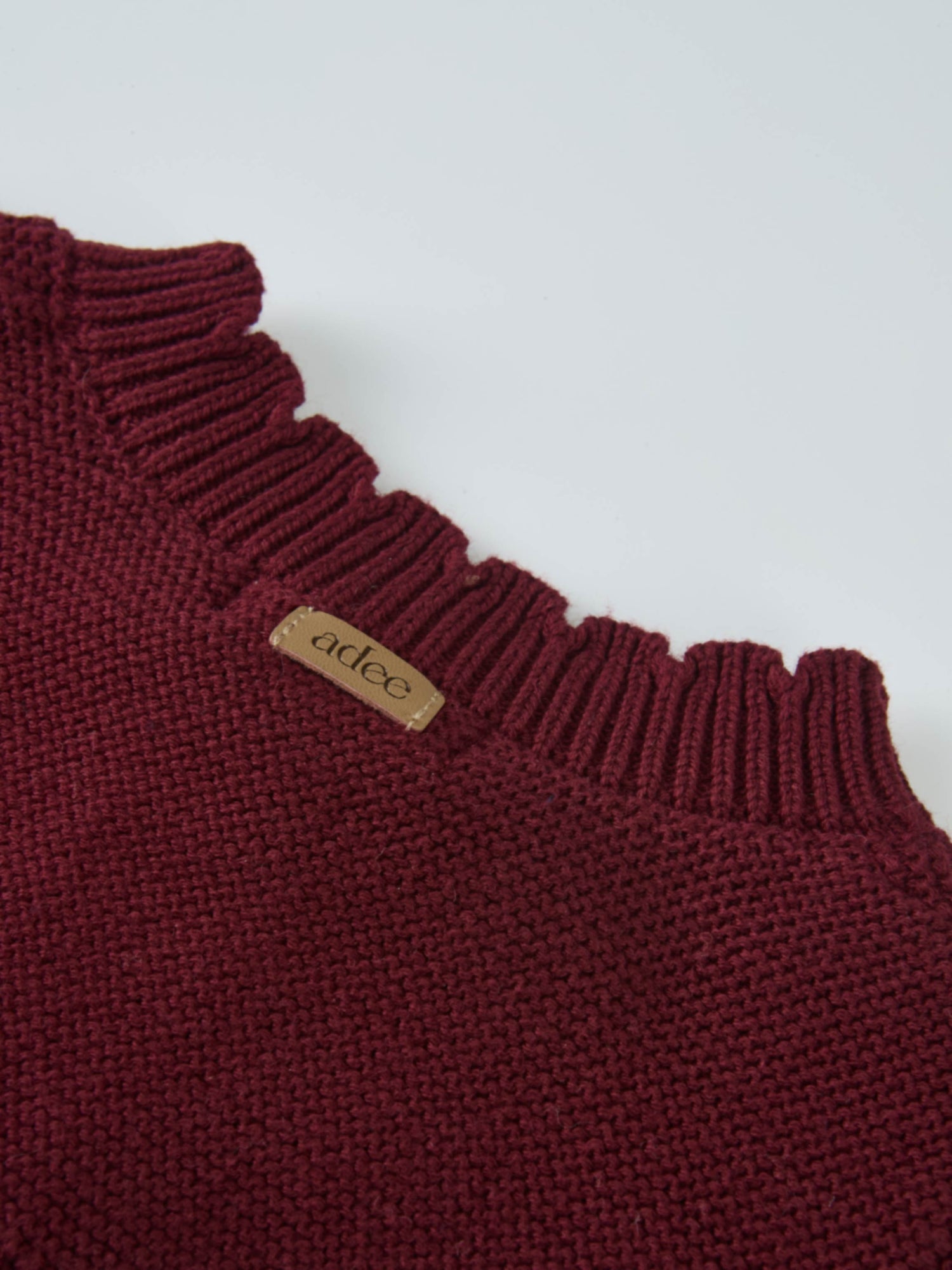 Cropped cardigan burgundy knit by Adee; unisex dressy top with ribbed neckline