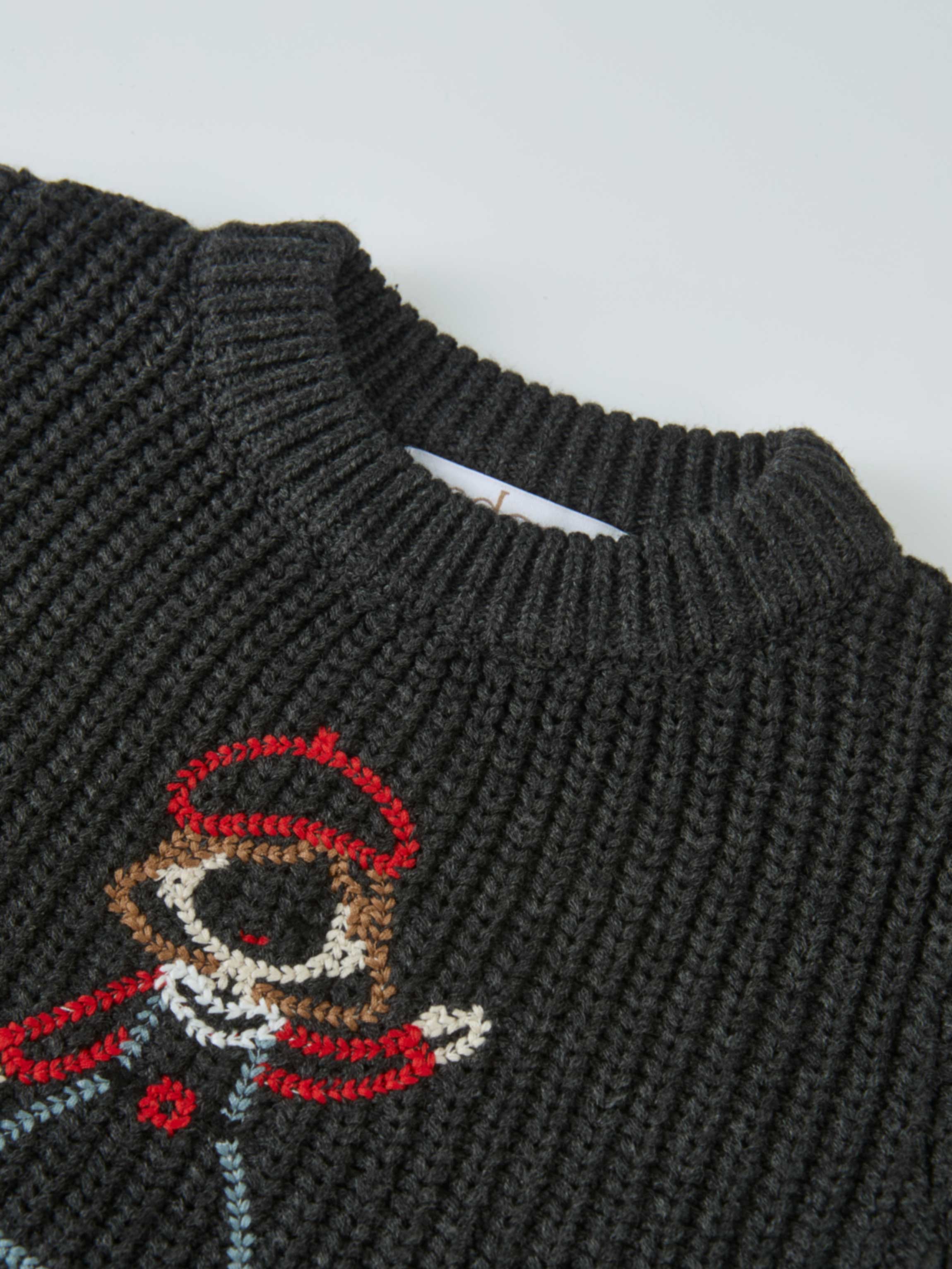 Knit Girl Sweater - Grey; dark grey knitted fabric with ribbed neckline and red-brown embroidered motif.