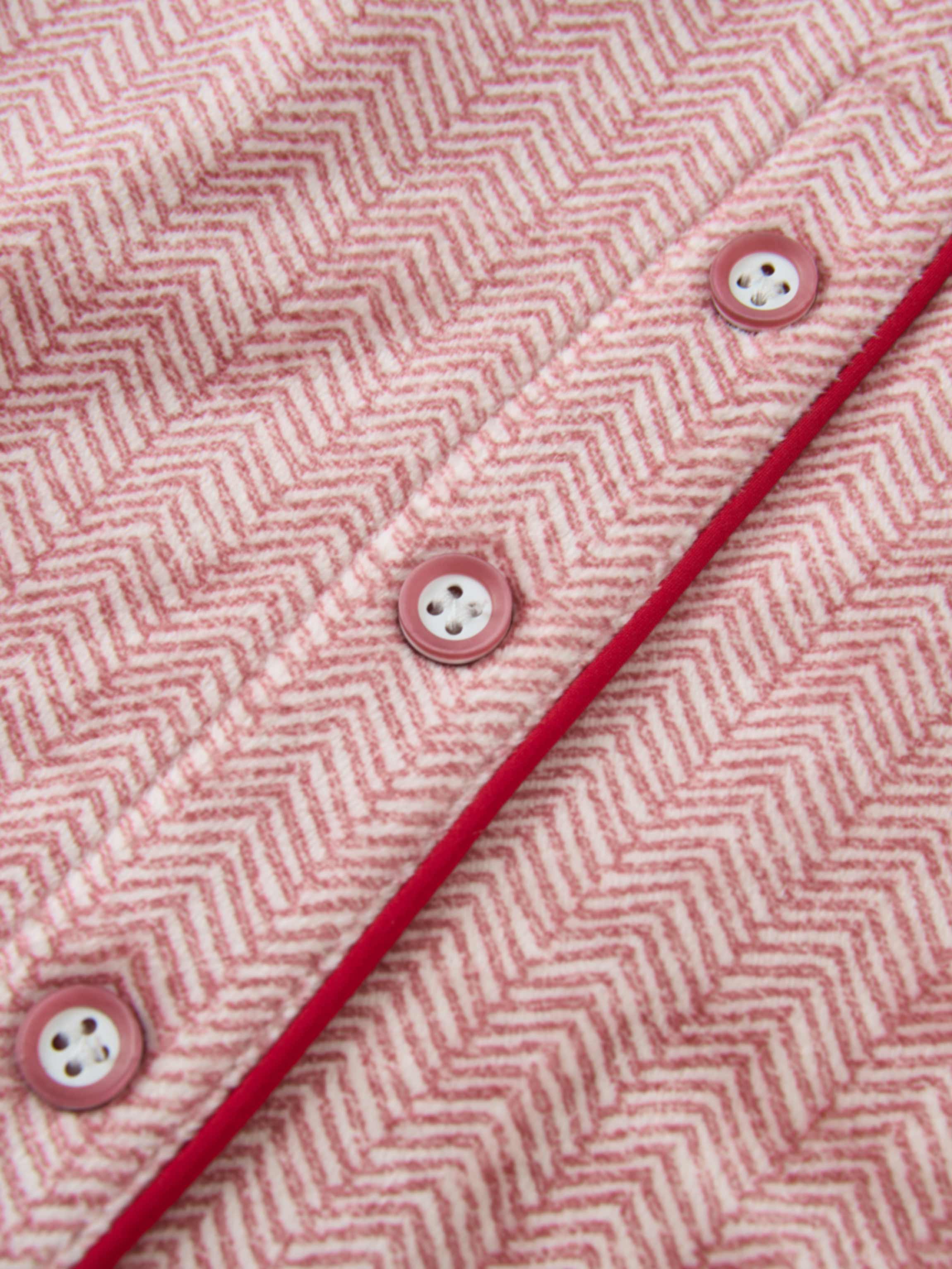 Herringbone Pajamas for girls in red by Adee; pink buttons and red piping.