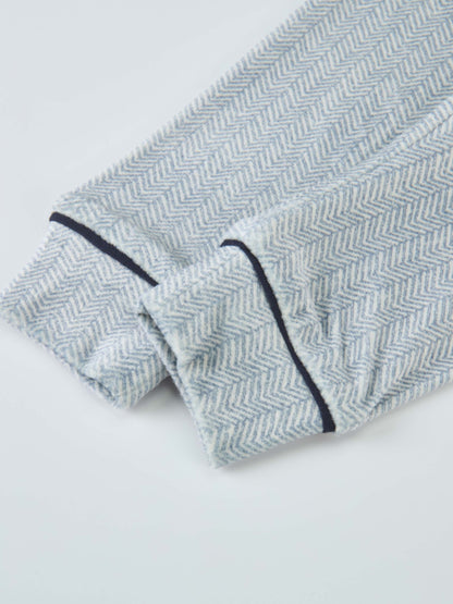 Herringbone blue boys pajamas with navy piping trim