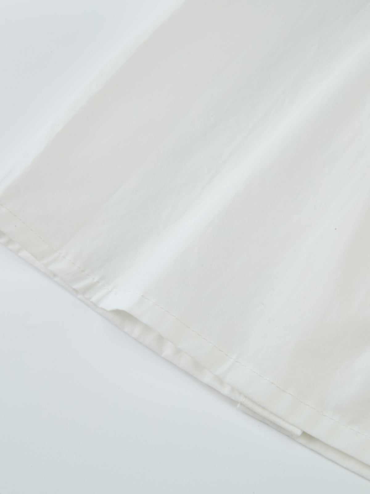 Peter Pan Collar Blouse - White, close-up of fabric and edge hem on a dressy girls&