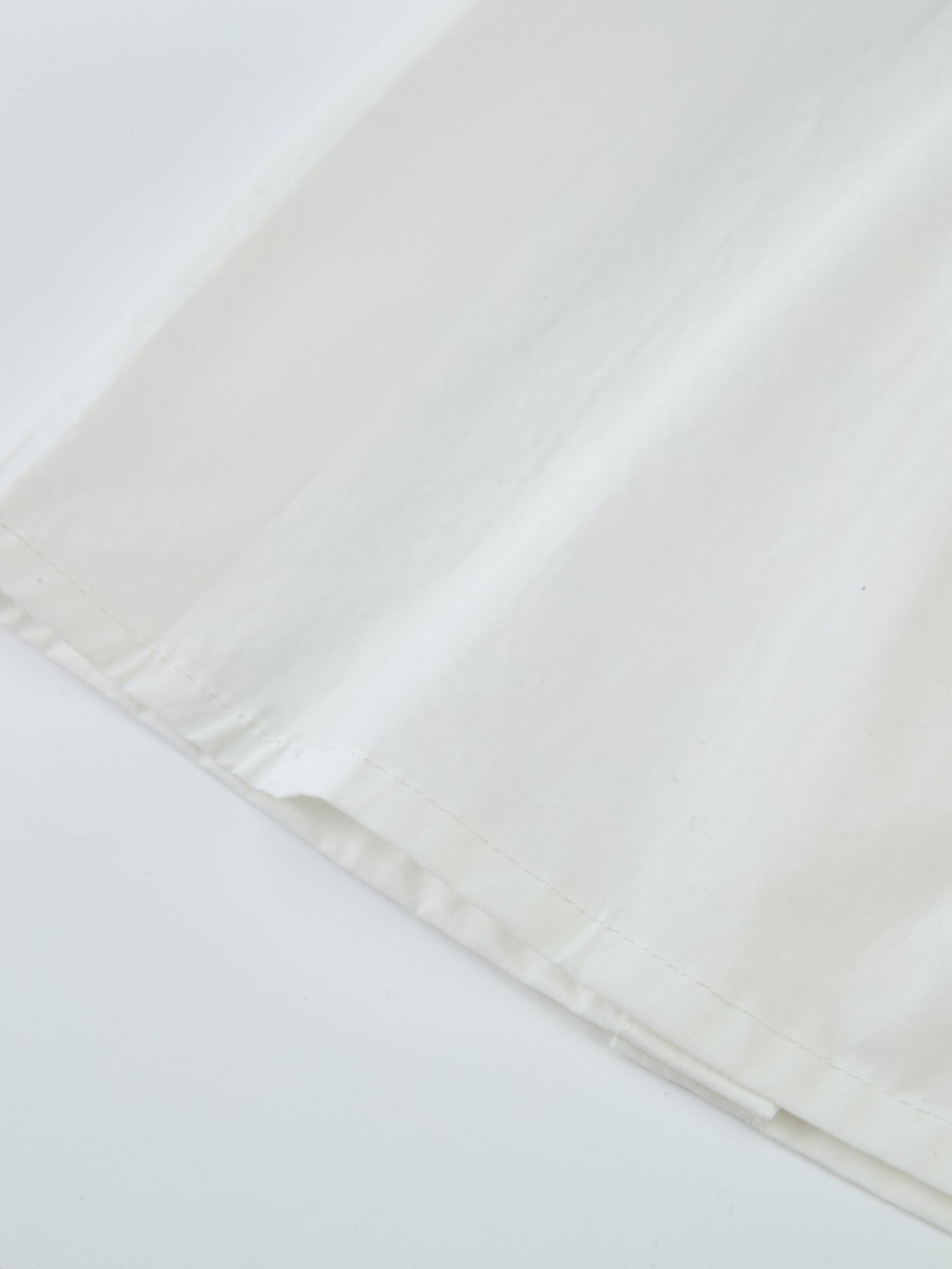 Peter Pan Collar Blouse - White, close-up of fabric and edge hem on a dressy girls&