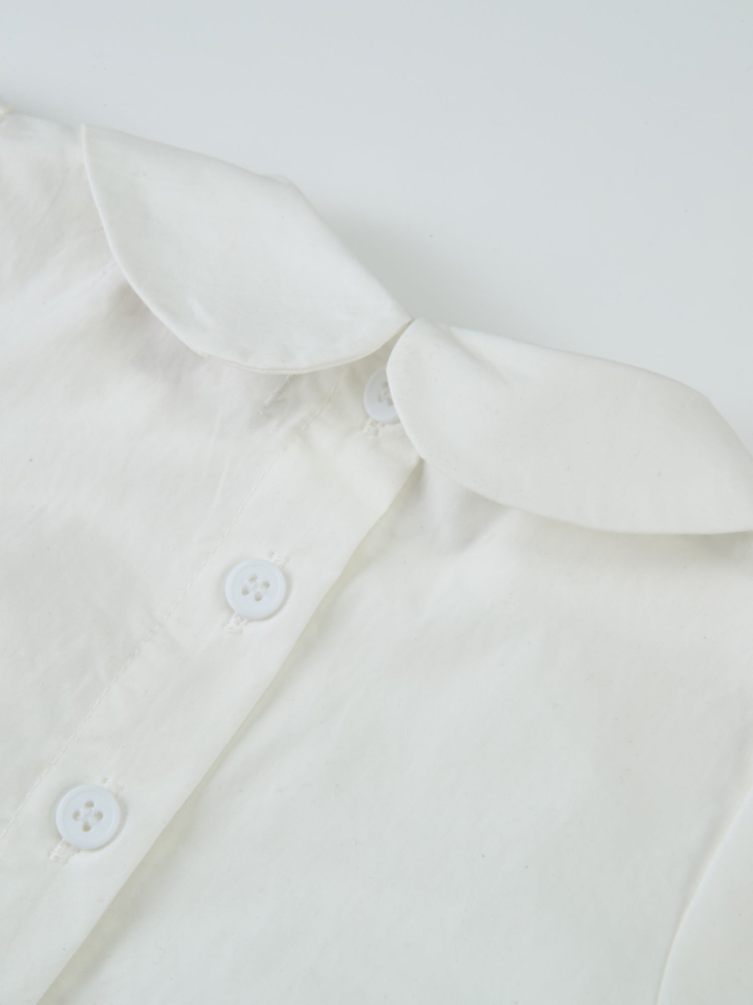 Adee Peter Pan Collar Blouse in white for girls—dressy top with front buttons