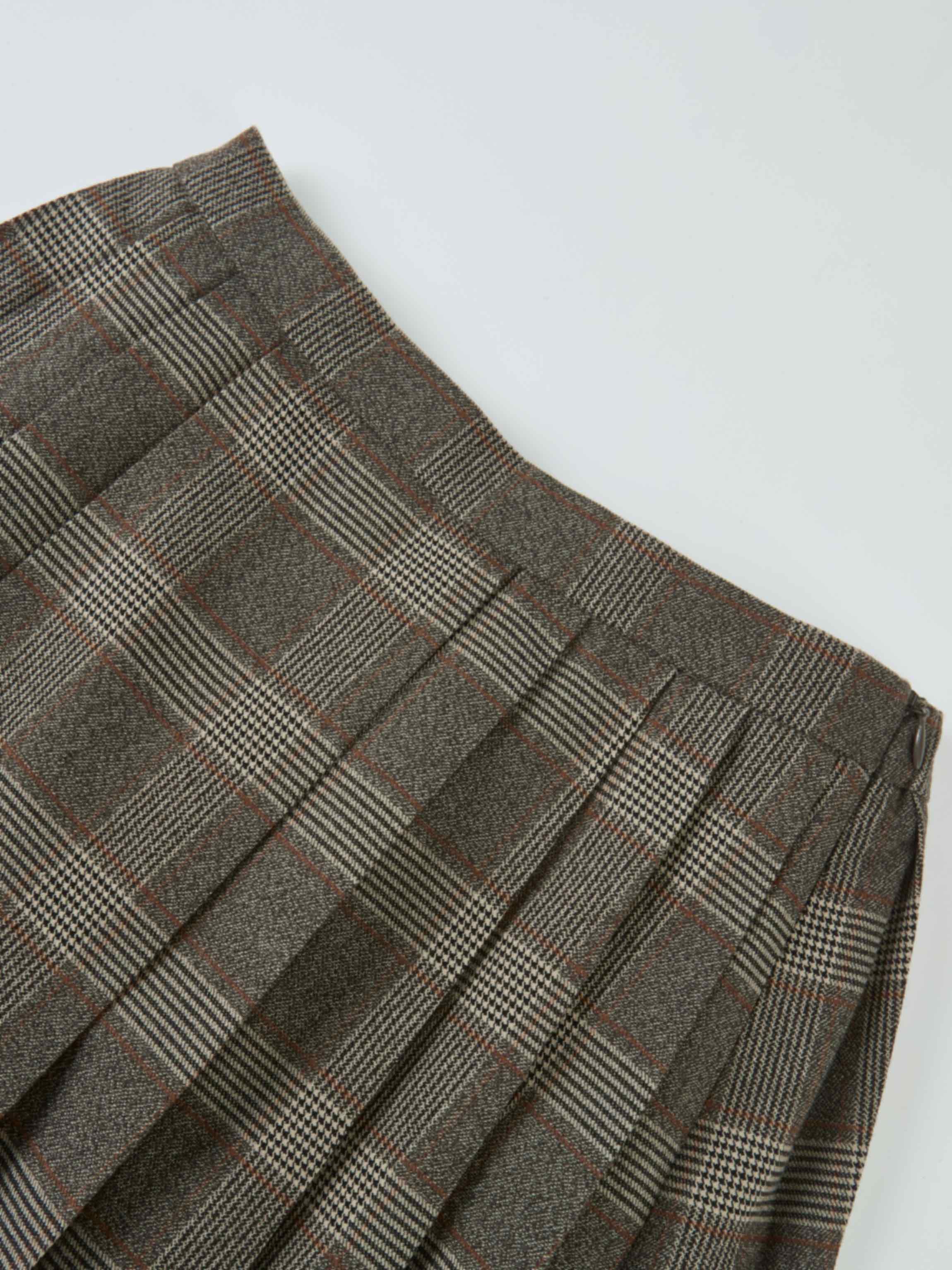 Girls plaid pleated skirt in grey with red lines.