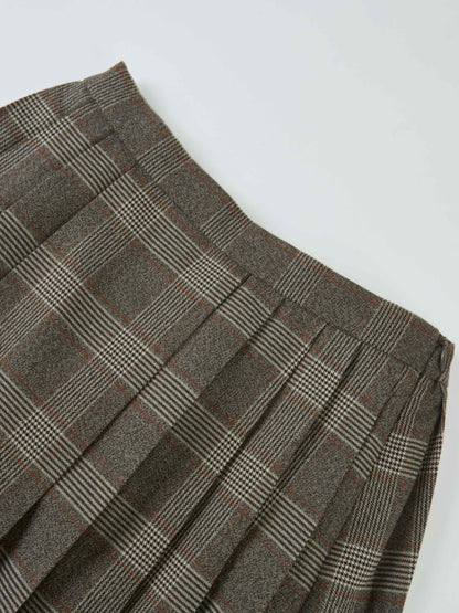 Girls plaid pleated skirt in grey with red lines.