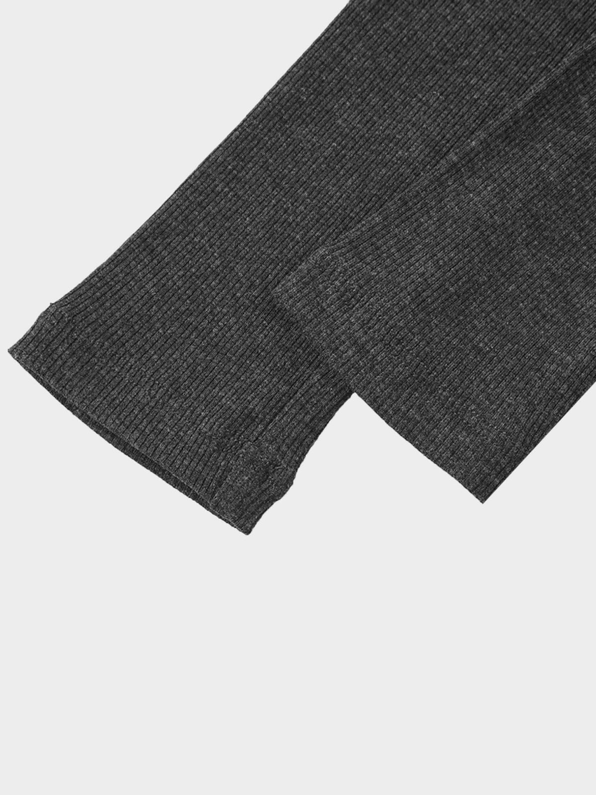Grey ribbed fabric close-up of a baby hooded leggings set, showing knit texture and cuff detail.