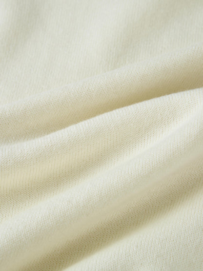 Ruffle Collar Knit Sweater - Cream close-up of soft cream knit fabric