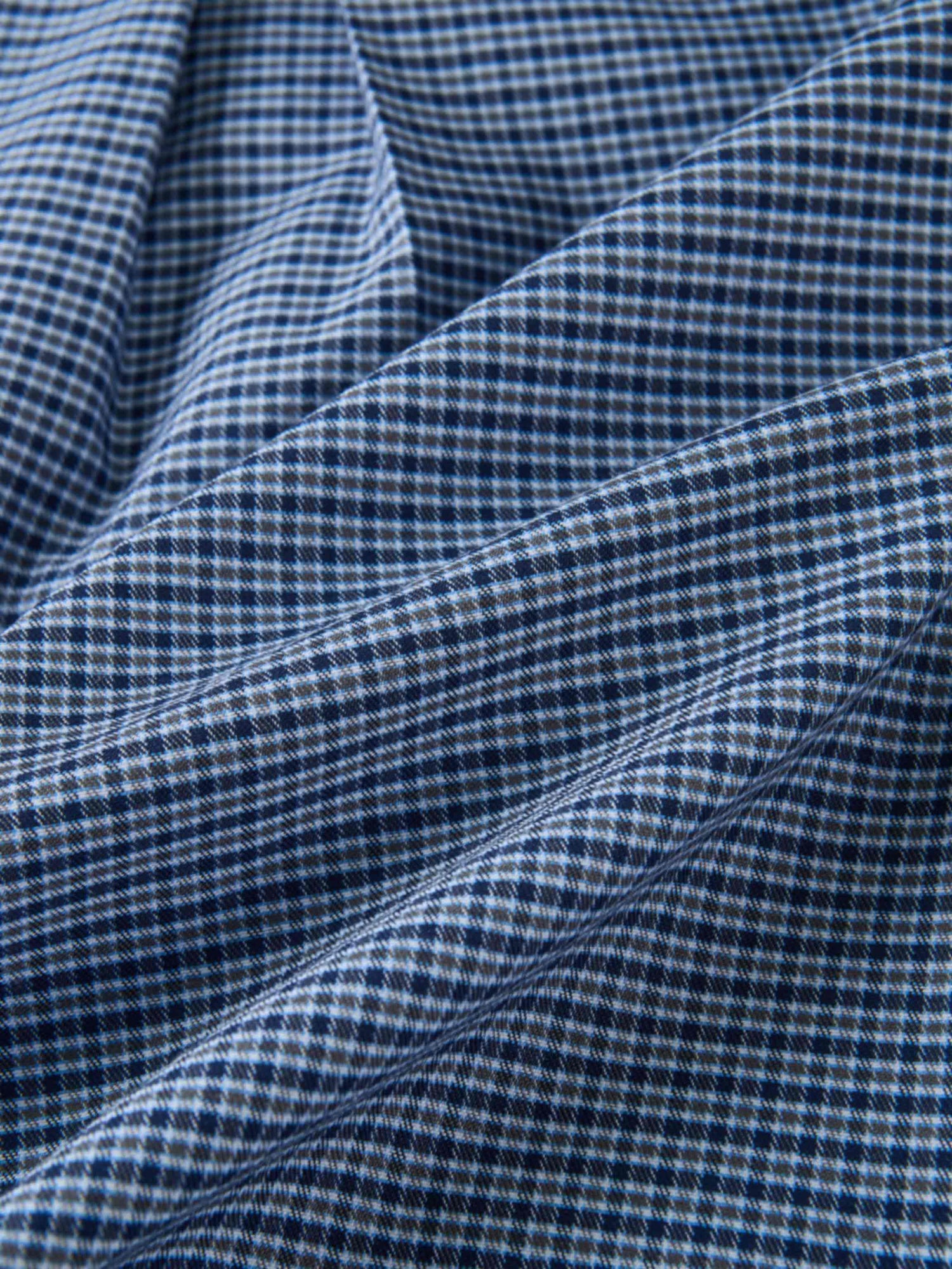 Plaid shirt navy fabric close-up; Adee brand boys dressy top.