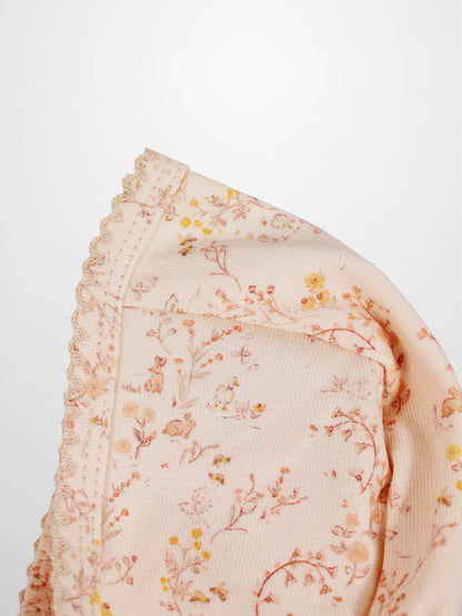 Sweet Meadow Bonnet by Adee, pink floral knit with ruffled trim.