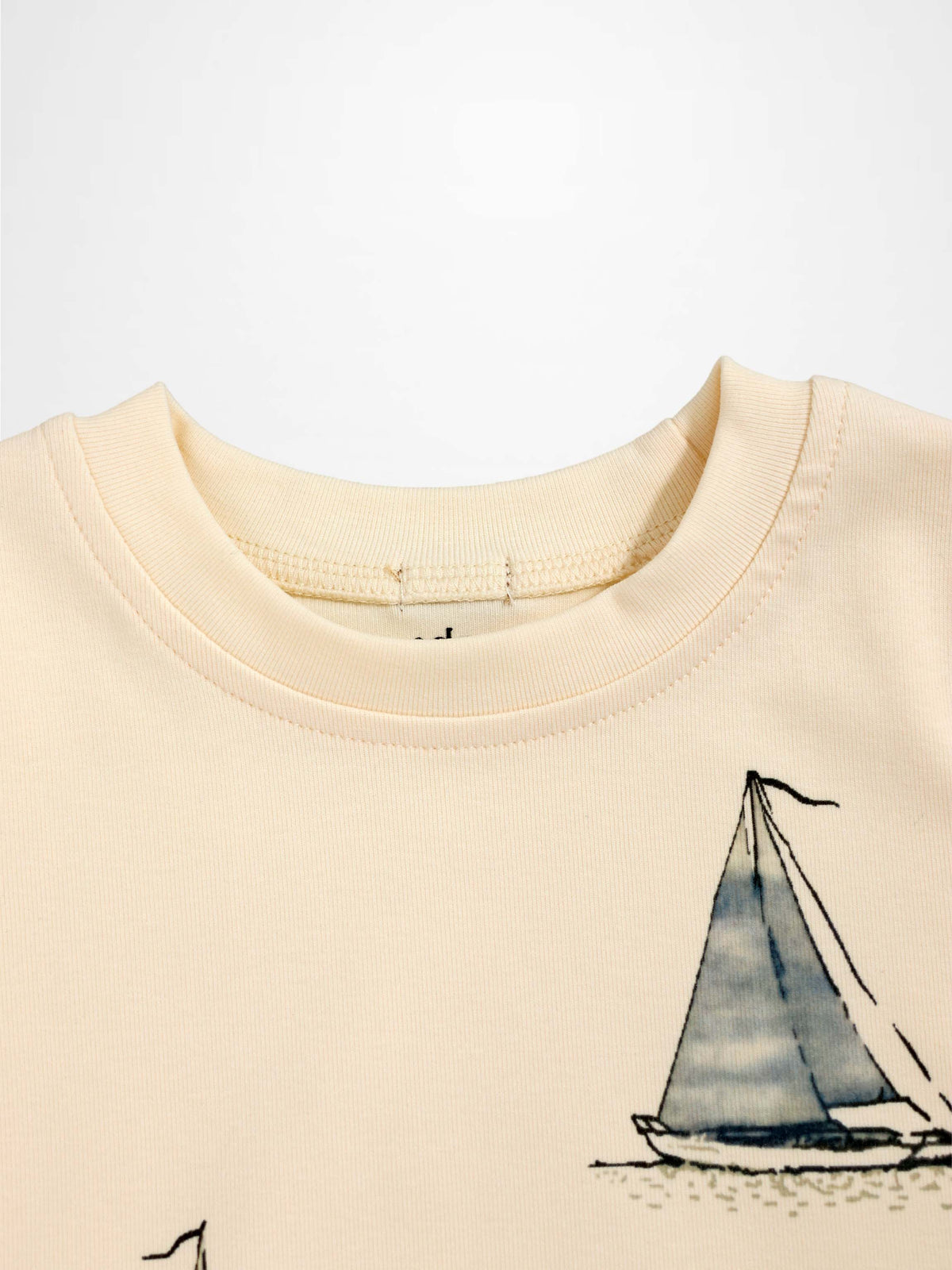Sail Boat T-Shirt for boys; cream fabric with sailboat illustration